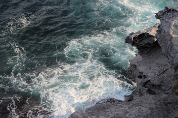 Sea Waves Crashing Over the Cliff