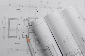 Architect rolls and architectural plan,technical project drawing