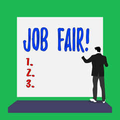Handwriting text Job Fair. Conceptual photo event in which employers recruiters give information to employees Short hair immature young man stand in front of rectangle big blank board