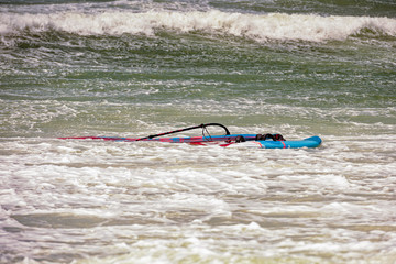 Windsurfer lost board in storm