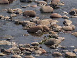 River rocks on a sunny day.