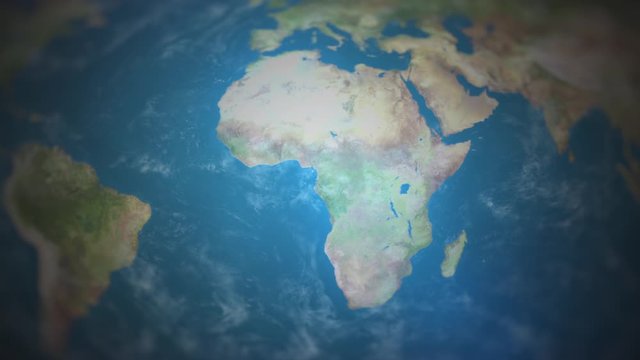 View of the world map with the camera flying over and focusing on Africa. Elements of this video are furnished by NASA.
