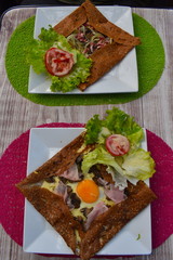 Classic savoury crepes pockets are one of the most famous French street food. Authentic home made European food served in the town centre.  