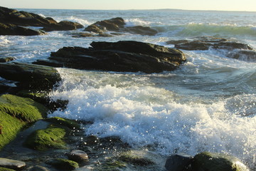 waves crashing on rocks