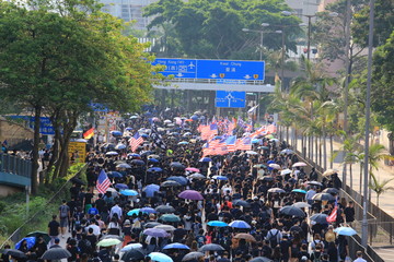 the protesters march in the kowloon area  in hong kong in october 20 2019