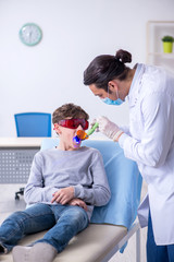 Young boy visiting doctor in hospital