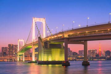 Fototapeta na wymiar Rainbow Bridge and Tokyo Tower at dusk