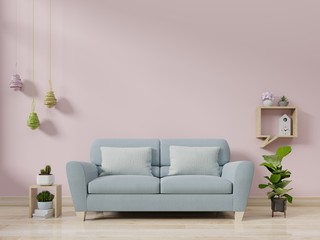 Modern living room interior with sofa and green plants,lamp,table on pink wall background.