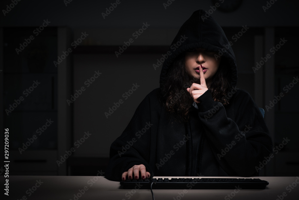 Poster female hacker hacking security firewall late in office