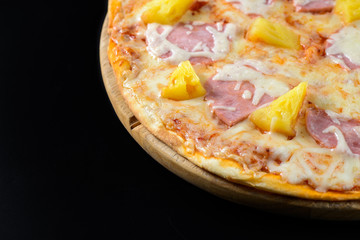 Hawaiian Pizza isolated on black