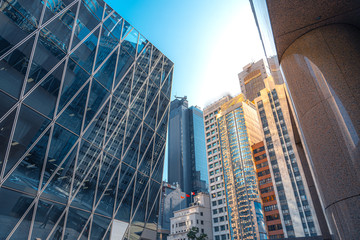 Fototapeta premium Modern office building close up in Hong Kong