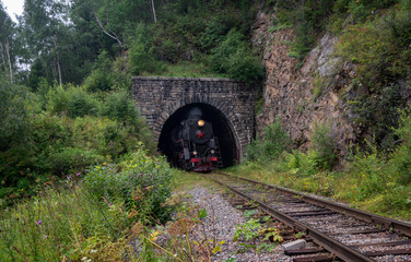 Steam locomotive on the Circum-Baikal Railway near lake Baikal in Eastern Siberia