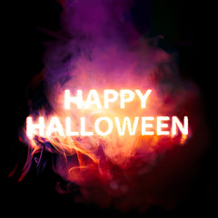 Fototapeta na wymiar Glowing Happy Halloween text burning red, orange, and purple smoke