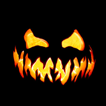 Scary Halloween pumpkin Jack o lantern face glowing red and yellow eerily on black