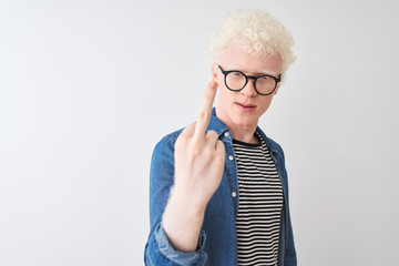 Young albino blond man wearing denim shirt and glasses over isolated white background Showing...