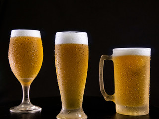 Droplets on freshly poured beer detail macro delicious unfocused