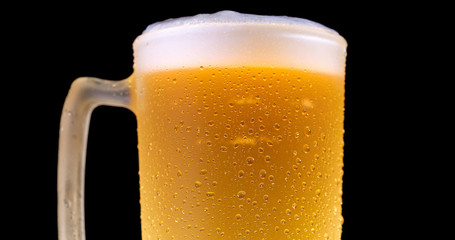 Droplets on freshly poured beer detail macro delicious unfocused