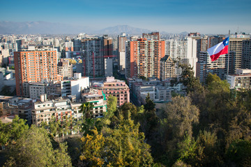 Panorama of Downtown Santiago Chile with Chilean Flag from Santa Lucia Hill