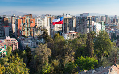 Panorama of Downtown Santiago Chile with Chilean Flag from Santa Lucia Hill