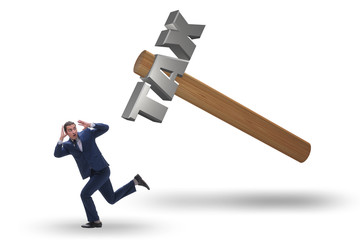 Businessman under the burden of tax payments