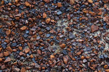 A bunch of broken rocks on the ground