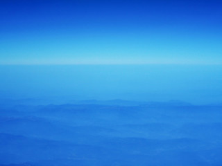 Abstract blurry blue sky gradient color background.