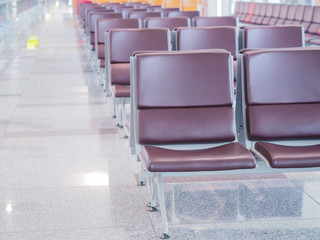 Empty chairs at the airport terminal.