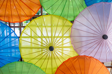 Wall from colorful traditional Thai umbrellas