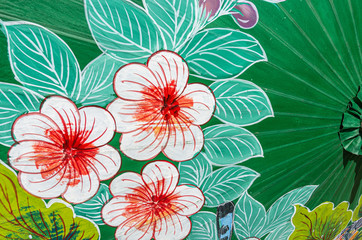 Detail of colorfull hand painted umbrella fabric - close up