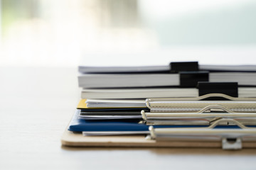 business  man Office employee working contract with documents Stacks of Files paper and law