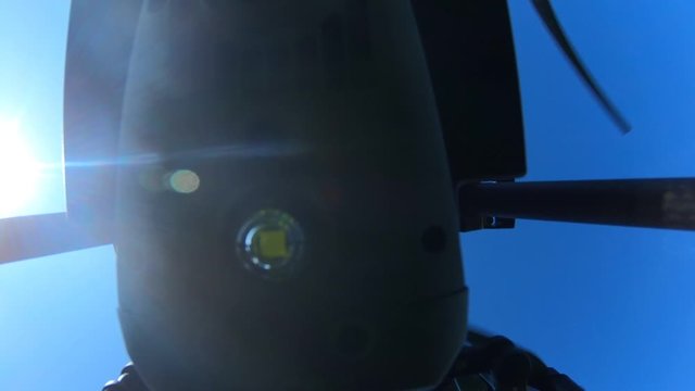 A commercial DJI Matrice drone flies up, up, and away.