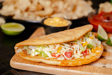 Close up Homemade Baja beef Tacos salad with tomato Salsa and Chips - mexican food