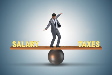 Businessman balancing between taxes and salary