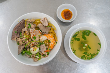 Tasty Vietnamese noodles with shrimp and minced pork in restaurant