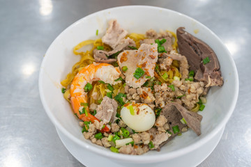 Bowl of delicious Vietnamese rice noodles with shrimp and pork