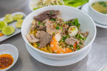 Bowl of delicious Vietnamese shrimp and pork mixed noodle