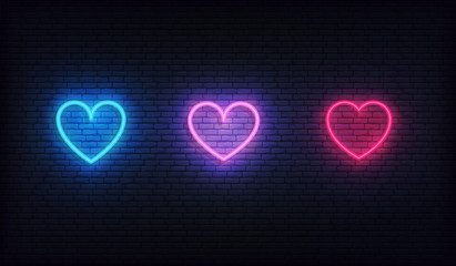 Heart neon icons set. Glowing bright red, purple and blue hearts - obrazy, fototapety, plakaty