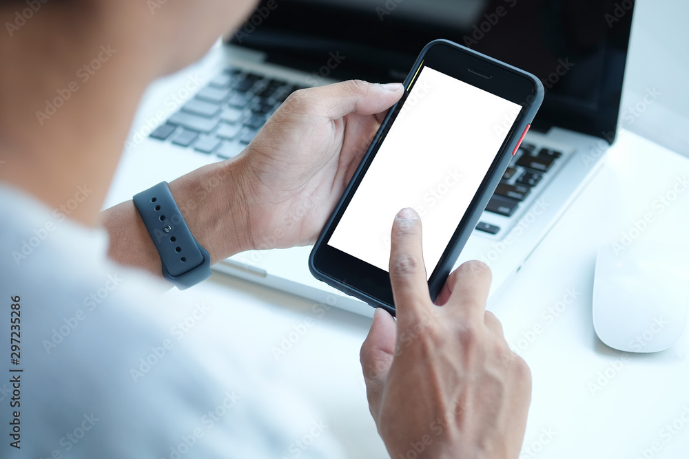 Poster cropped shot view of man hands holding smart phone with blank copy space screen for your text messag