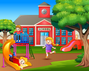 Cartoon kids playing on the school playground