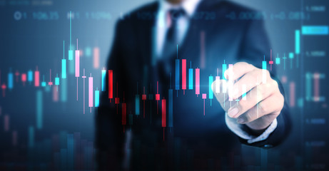 Double exposure businessman pointing line dot graph. Technical price candlestick chart graph and indicator stock online trading