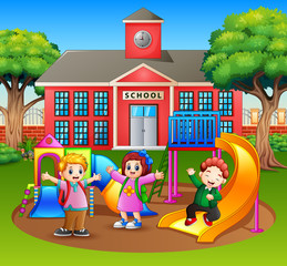 Obraz na płótnie Canvas Happy kindergarten kids playing in the playground