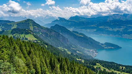 Fototapeta na wymiar Switzerland, Panoramic view on green Alps and lake Lucerne