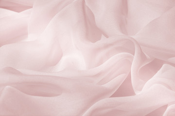 Light draped chiffon fabric in pink for festive backgrounds - obrazy, fototapety, plakaty