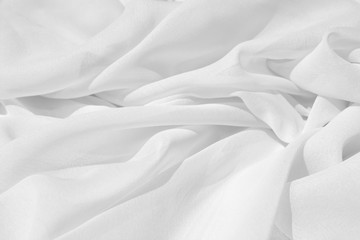 Light draped chiffon fabric in light color for festive backgrounds