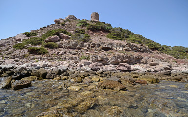 Scenic view of the rocky hill on the Sardinian sea near Torre del Porticciolo beach, with an...