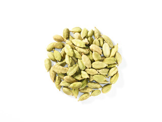 Handful spice Green Cardamom (Elettaria cardamomum) on a white background