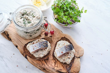 Forshmak - traditional Jewish cuisine. Sandwich with minced herring fillets with apple, onion and...
