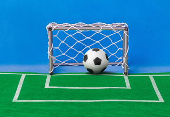 Toy football field and gate