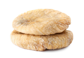 Tasty dried fig fruits on white background