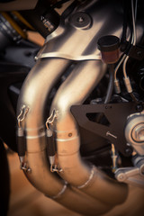 Fototapeta na wymiar Modern motorcycle exhaust pipe